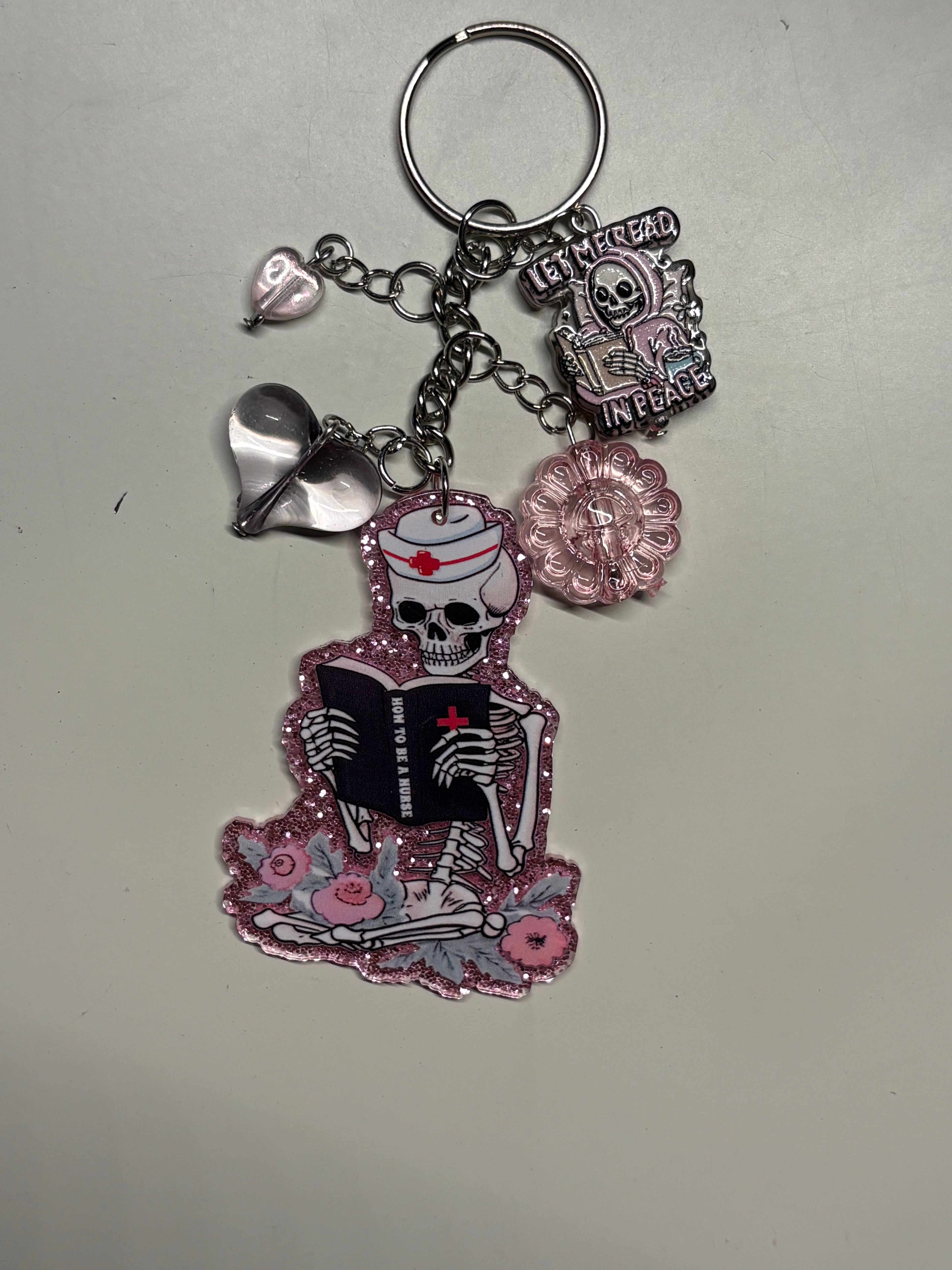 "How to Be a Nurse" Skeleton Bookworm Junk Keychain